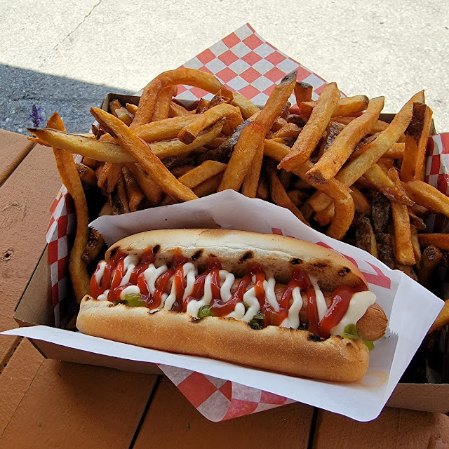 Hot dog and a basket of fresh-cut fries